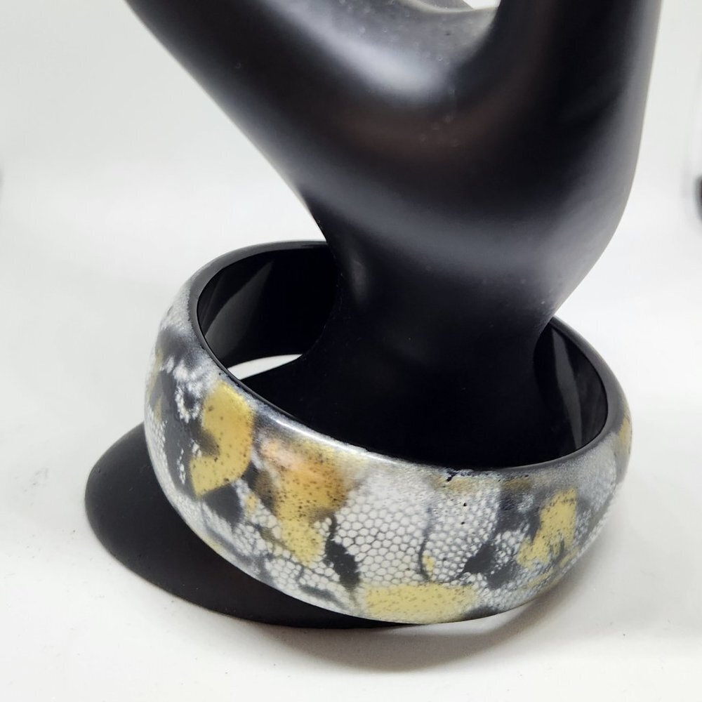 Gold, black and white Bangle